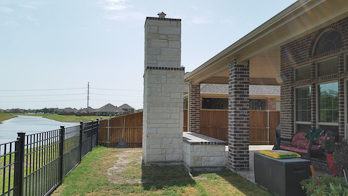 Outdoor white stone chimney